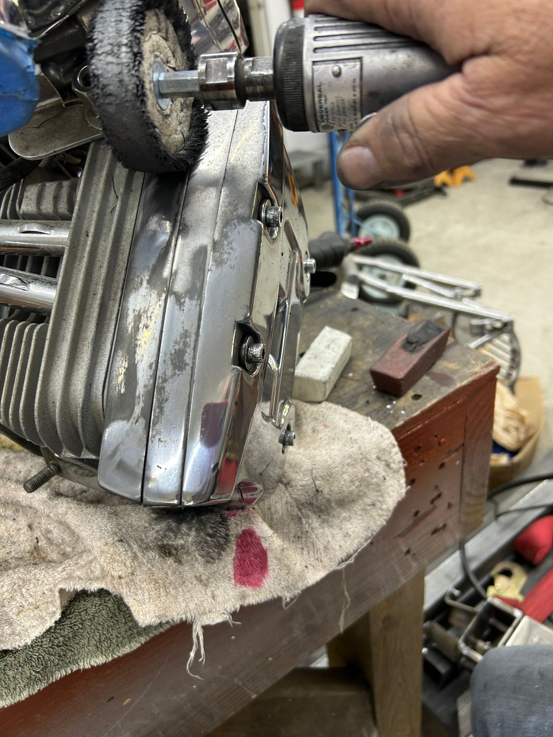 Cleaning up the engine and put back together  as taking off all the finger print dust film that was on all over the bike from the police . 