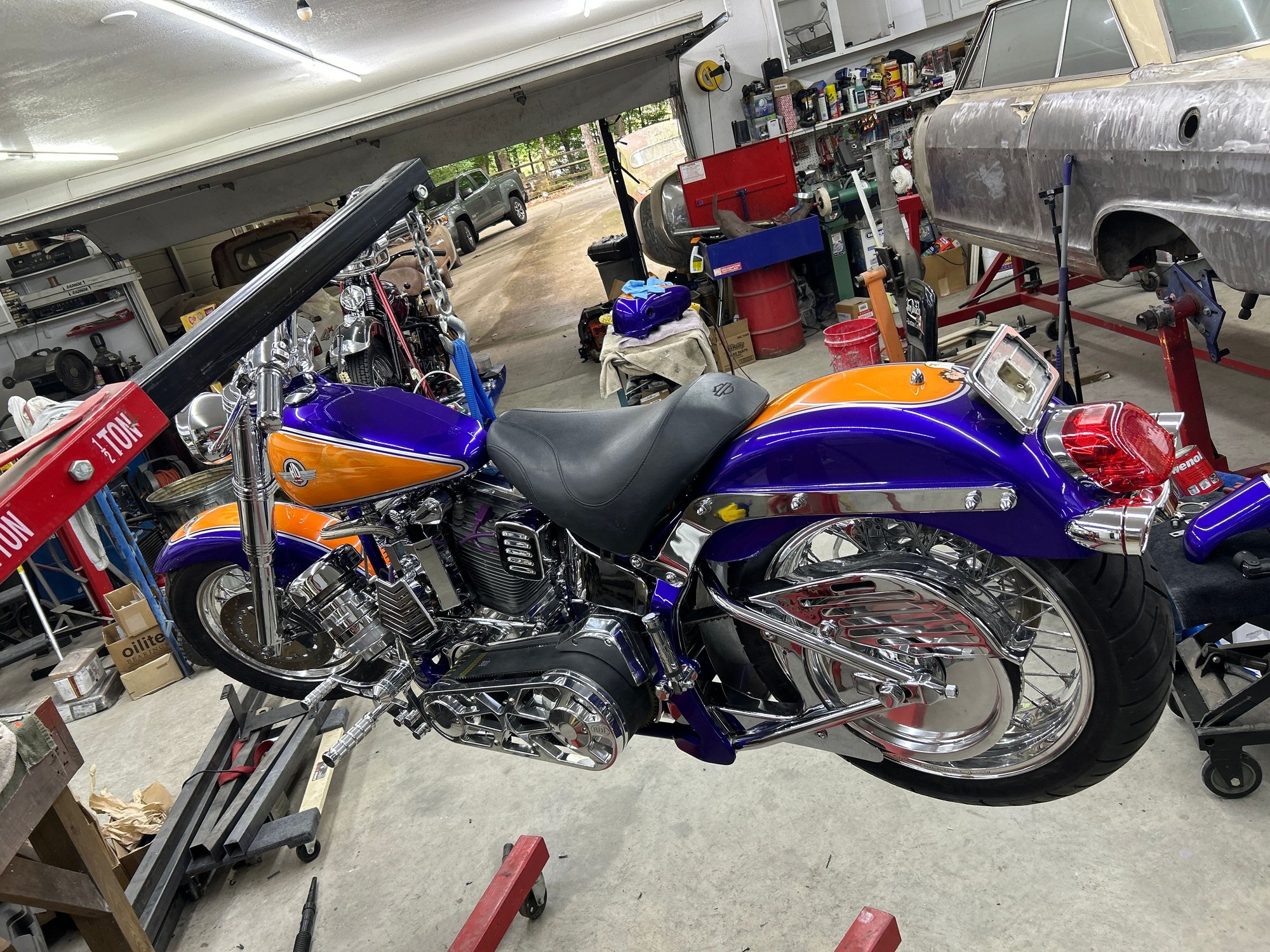 left fuek tank on and pet **** hooked up with cross over line on  and checking the seat fit after cleaning it up man it was bad .That it clears all the battery wires and the computor for the crane cam unit 
