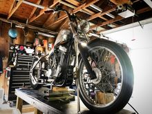 Moved to a new house with a better garage and have been tinkering around on it. I have the harness done. It wasn’t bad at all. I welded up my handlebars too. I’m not running any switches. I put a push button starter directly on the starter. The only lights on the bike are the taillight and headlight.