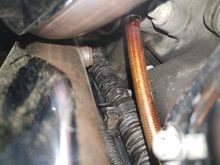 Oil is leaking out from between metal crimp end piece and braided/ coated cable.