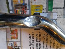 Had to dimple - dent is probably more accurate, the front pipe to clear the throw-out lever.