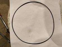 The old O-ring, that I pulled off the case.  No rips, no tears, and no pinch marks...  I did replace it with a new one.  The new one is a funky blue color and is a little bit thicker.