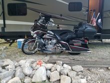11.5" progressive 444 rear shocks and 2" progressive lowering kit in front. No bottoming out and much better handling.