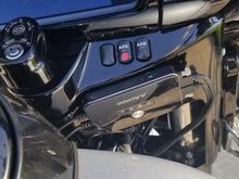 DVR mounted with automotive high strength double stick tape to face of switch housing.