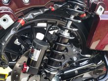 Not sure about the stockers but the RWD's I just put on had to be mounted upside down on touring bikes for bag clearance, seemed weird to me but I called RWD and they confirmed upside down was correct and has zero impact what so ever on performance.