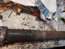 The packing had been removed by the previous owner.  This created the horrible sound and discolored slip ons. 