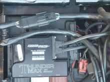 This is the connection on top of the battery and under the seat.  I believe this is for the tank gauges. 