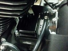 On my 2020 Glide, I run the hose down above the frame tube, no filter. There is zero residue on the frame or elsewhere. In the Trask instructions, they state you could push oil out of the vented cover if your engine is without the seal on the oil pump back cover, which your stock 2018 will not have. The intake on my bike is clean, I am very satisfied with these results. 