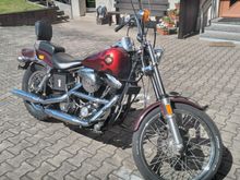 Ok here you can see the original Seat & Sissybar are back on, the Louvered Chrome Battery Cover are gone along with the funky Oil psi Gage is also gone , the Eagel Sprit Point  Cover has given way to an OEM V2 Point Cover, the Battery has recived the Patent aluminum Emblem !