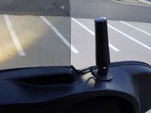 My Antenna for the Onyx, the wires run in underneath the fairing and come up through the windshield vent to the unit.