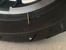 I must be crazy. Left this screw in the tire and put 5,000 miles on it. Still handles perfect 