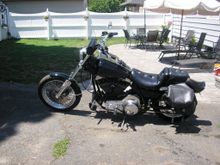 84 FXR , Raked, 3" over forks, lowered 1.25" in the rear.  Andrews Cam, Mikuni Carb, Single fire ignition, Heads ported and shaved.  Got married on that bike, rode it right to the church.