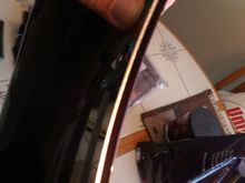 Never did get the darned stainless piece to fully conform to  the curvature.  It comes flat.  Both ends eventually un-bonded the 3M tape and stick out, but only 1/16 of an inch o so, so I'm OK with it, I guess.