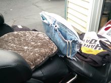 Hey, it's survived three years and over 9 thousand miles of  road trips.  And the jeans were obviously well past their prime!  No, I can't sew, it's all stapled together!