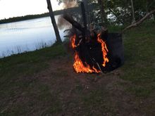 Burning the paint off the fire ring we made.