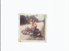 Gunny your living the life, a nice Glide and i like what you did with the military Slim.

Now this is a very old photo August of 69, i was back from Nam about 3 weeks, but this is a somewhat faded photo of my 68 Orange and black '68 Sportster.