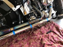 Recommend marking the pipe clamp locations with blue tape BEFORE putting the heat shields back in place.  Otherwise you are working blind.