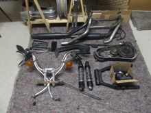theses parts will be sorted out & grouped by the various coatings that will be applied , such as the black wrinkle paint, gloss black powder, & satin black powder, the rear exhaust header pipe will be ceramic coated . . . 