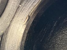 Corresponding dent in seat--which I have to say has lousy sealing surfaces in general