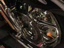 I think this is made by condor, it has the HD labels.  I got this at a swap meet, in the box for 150.

The make servicing, cleaning much easier and keeping the bike upright reduces the room needed in the garage.