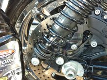 Added 12" HD premium rear shocks, HD premium low single cartridge front (low) when I chromed out the front end, and added narrow primary so my feets can reach the ground. 