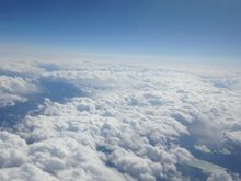 Flying high above the clouds --Sadly had to leave and return back to the dreary weather of the Northeast