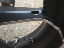 I was just cleaning brake dust off my wheels and came across this hole in the rim. It looks like shit and doesn't look like a factory hole. I have 2 on the front rim and about 4 on the rear. Is it a drain hole? I just noticed it tonight on my 2017 Road Glide Special. I've had her 2 weeks. Any thoughts?