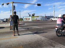 Street jugglers and a local couple on a bike, I think this is La Paz