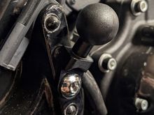 Here's a generic 1" ball with a 3/8 hole, perfect for mounting on the passenger peg (which I don't run)