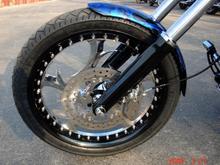 FRONT WHEEL - Left
21" Renegade Elite Multi-Piece (vs 19" Stock)
Matching Full-Floating Rotor
Powdercoated Fork Lowers
HHI Roadlock Front Caliper