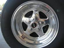Weld racing prostars...rears are 15x8 4.5 backspacing with 255 60's, fronts are 15x7 4.5 backspacing with 225 60's.