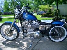 '92 Sporty, oversized wide white walls, chromed engine, chopped rear fender, 10" shocks, 6" T Bars.