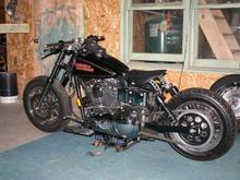 mocked up bars, new seat/mounts, struts chopped, progressive lower shocks, spoked rear wheel with new tire, more to come