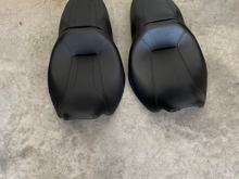 Both seats are off of Street glides, one on left is 2014 stock and the one one right is off the 