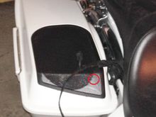 The Red Circle denotes the screw that is missing...