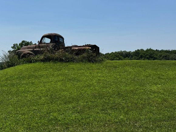Old rusted Dodge Truck on a hill on my way over.