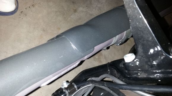 This is the heat shield thst made its way all the way through the paint coating to steel. That's normal, right?!