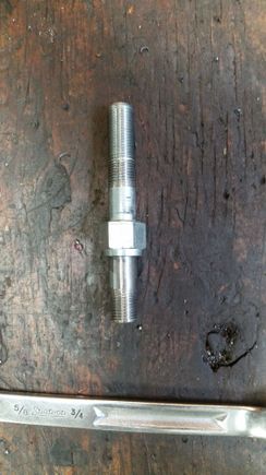 Here's the modified upper mount. Note the reduced shoulder on the hex and shortened stud for the upper shock eye.