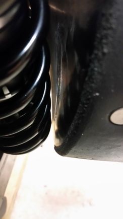 And here's the resulting clearance between the shock and the bag at the bottom, using the provided spacers, which are stainless, instead of my fabricated spacer, which was aluminum.