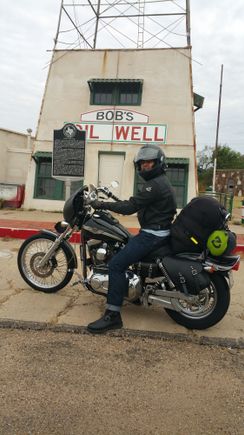 I have matching bag on the other side.  Been running them for about a uear already; no issies with rubbing on belt guard or axle nuts.