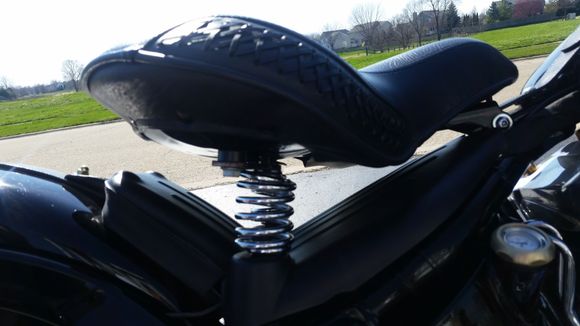 Springs in front of bolts instead of behind