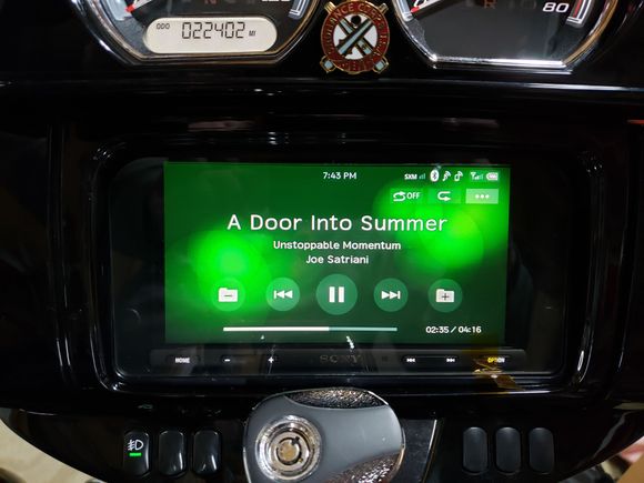 The Biketronics splash cover is installed- they don't add the "knob"; it's included and you can drill the cover and install it where you'd like (drill a 1/8" hole).