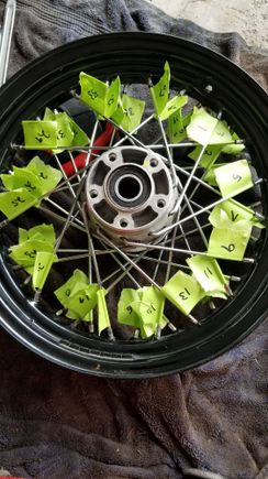 Labeled all of the spokes and placed the tape right where the spoke nipple was seated - might have helped keep the rim close to true but probably an unnecessary step