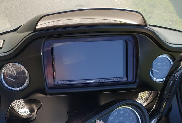 The Biketronics Sony XAV-AX5000 kit installed. Not seen are the BT4180 amp, Arc Moto 602s in the fairing and Alpine SPR-60s in the Tour Pak pods.