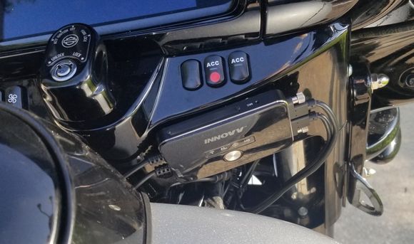 DVR mounted with automotive high strength double stick tape to face of switch housing.
