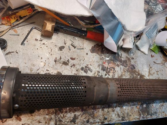 The packing had been removed by the previous owner.  This created the horrible sound and discolored slip ons. 