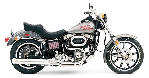 Heres another bike i wanted actually put a deposit down on one . Backed out and bought a Kawasaki Z1R. The 77 lowrider in that color was a looker .