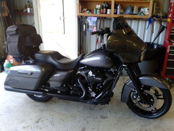 Nicely done, sans pinstripe and tank badging.

Beautiful black out.

Looks custom clean.