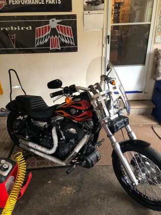 Hd windshield with a fork bag. The fork bag is a must for my set up. 