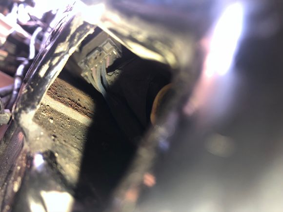 I can see the connectors through the hole where the grommet was.